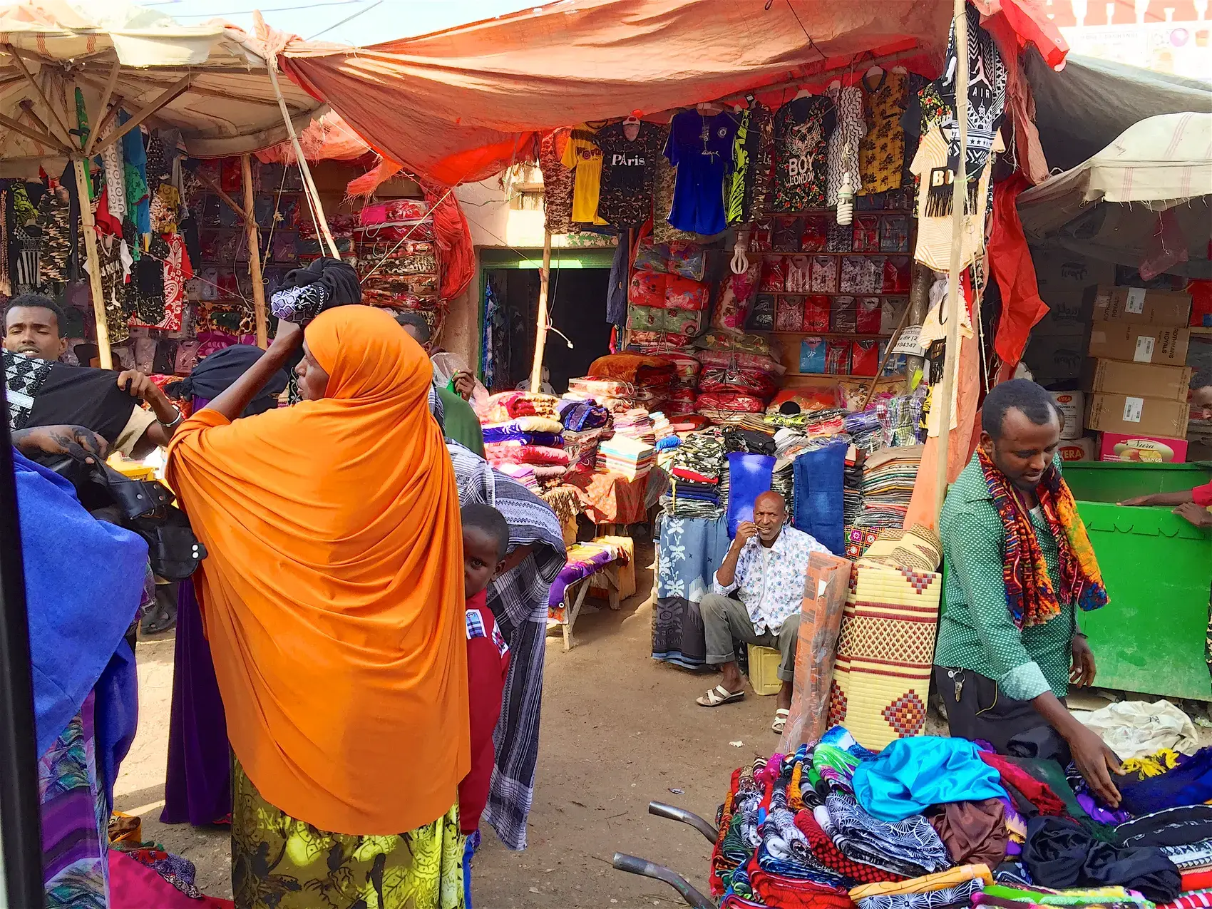Stalls and shoppers in a street market in Hargeisa